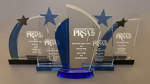 a group photo of five prsa awards